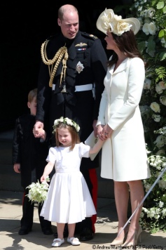 WINDSOR, UNITED KINGDOM - MAY 19: Prince William, Duke of Cambridge and Catherine, Duchess of Cambridge with Prince George and Princess Charlotte leave St George's Chapel, Windsor Castle after the wedding of Prince Harry, Duke of Sussex and the Duchess of Sussex on May 19, 2018 in Windsor, England. (Photo by Andrew Matthews - WPA Pool/Getty Images)